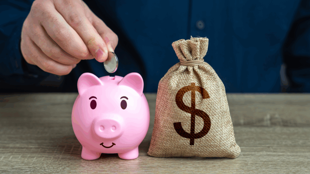 Man saving money in the piggy bank